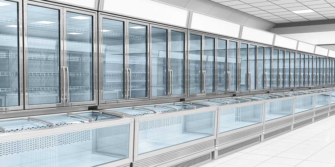 Interior empty supermarket with showcases freezer